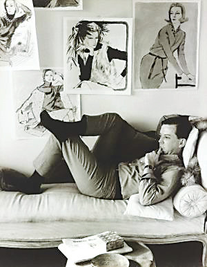 Illustrator Jim Howard in 1965, amidst fashion drawings of the period. “Drawn to Glamour, an exhibit of about 100 of his works is open at the Denver Art Museum.