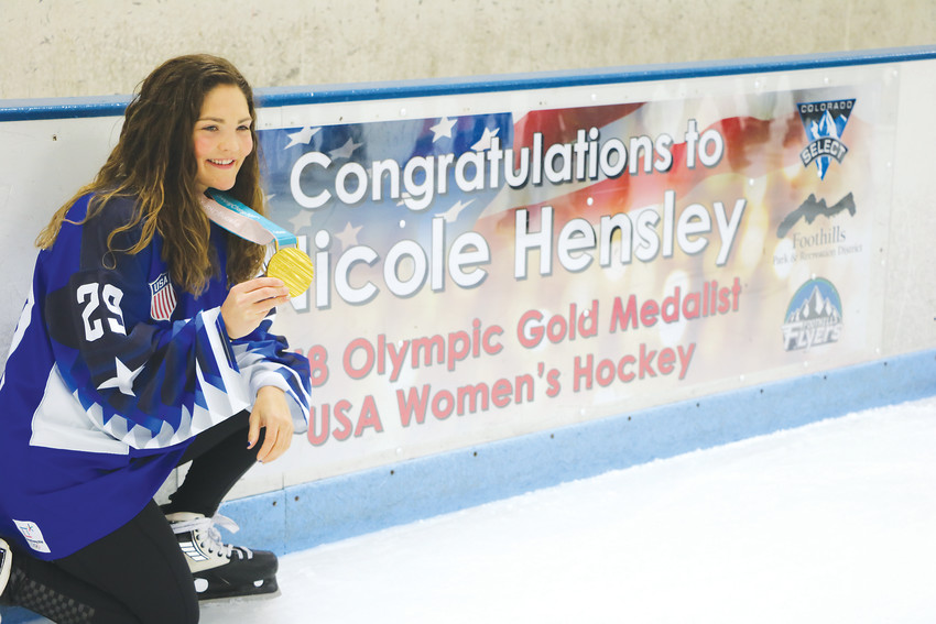 Olympic gold medal winner Nicole Hensley stopped by her former home ice on April 15 to skate with young hockey players and tell her story.