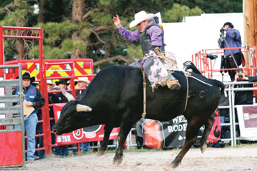 Steve Woolsey of Payson, Utah, takes a spin on a bull at last year’s Elizabeth Stampede