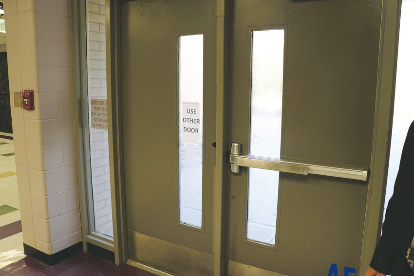 One of Douglas County High School's Tier 1 needs is a broken door, which costs about $700 to repair, according to district staff. The repair is considered urgent because it impacts the safety and security of the building.