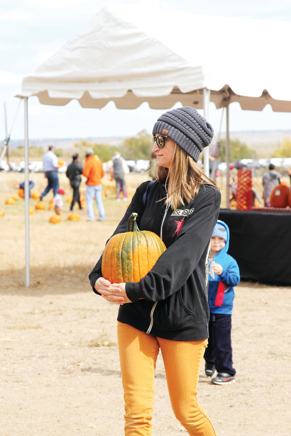 Ali Loomis of Centennial traveled to Lone Tree’s Schweiger Ranch Fall Festival with her two sons to pick their pumpkins.