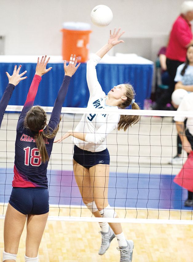 Valor Christian's Lily Thomason (9) lines up her kill as Chaparral's Emma Ammerman (18) readies for the block. The Eagles ended up on top winning the State Final 3-1 Saturday at the Denver Coliseum.