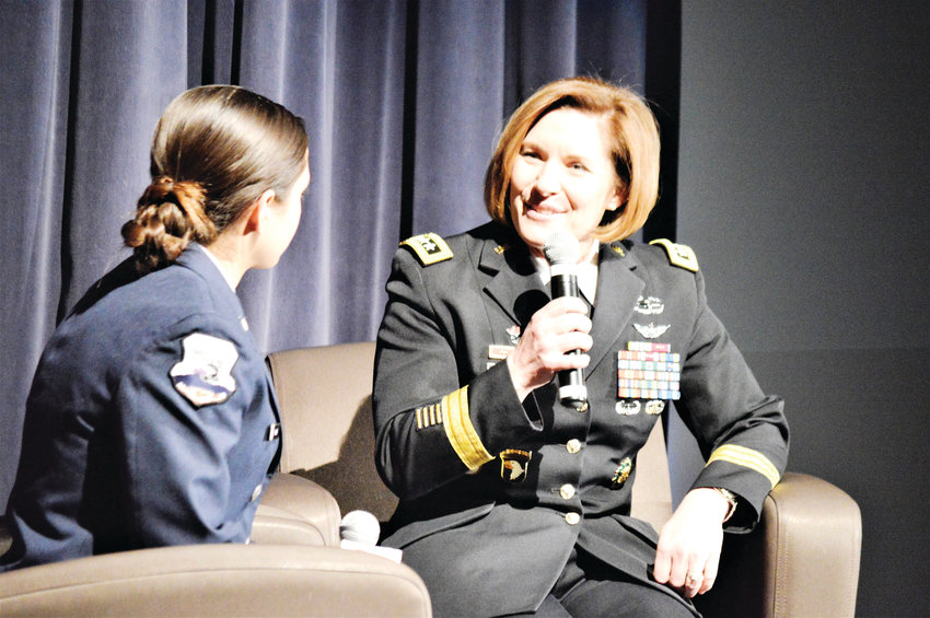 Lt. General Laura Richardson, the acting commanding general of the United States Army Forces Command, talks with Northglenn High School Junior ROTC Cadet Gabriella Gomez March 4 at Northglenn's D.L. Parson's Theater. Gomez, a senior, is a competitive swimmer just like Richardson was when she attended Northglenn High School.