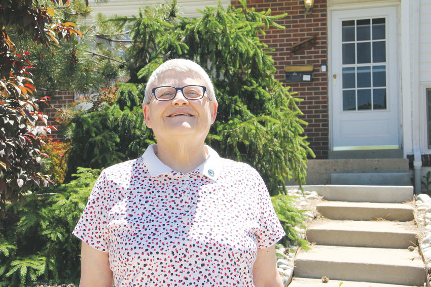 Andrea Suhaka, a longtime Centennial resident and former Centennial city councilmember, stands in front of her home June 13 in west Centennial, not far from East Arapahoe Road and South Quebec Street.