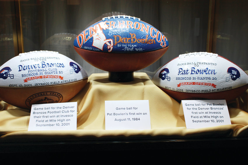 Game balls from past years that were presented to Pat Bowlen.