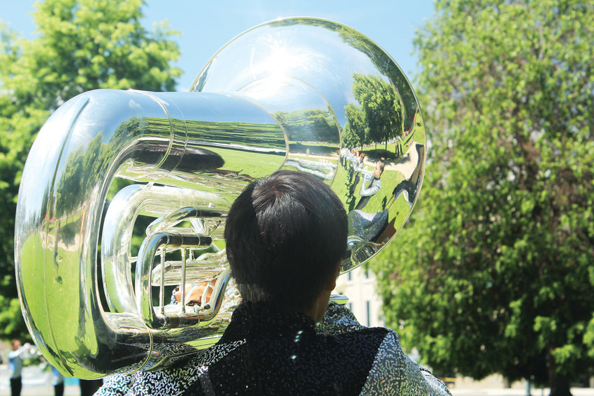 A tuba player with the Blue Knights plays during a performance in Denver. Typically, the Blue Knights perform in formations, but the June show was a standing performance at the Greek Amphitheatre in Civic Center.