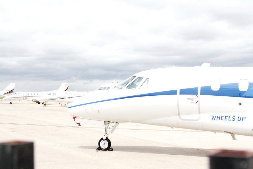 Planes stand at Centennial Airport in May. That airport is among those that may have flight paths rerouted by the Federal Aviation Administration’s Denver Metroplex plan.