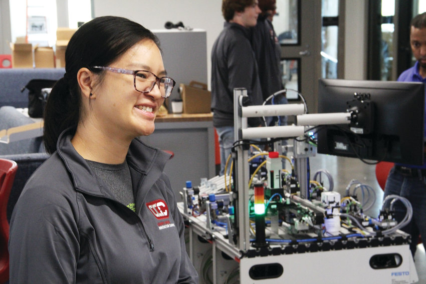 Jocelyn Nguyen-Reed, an information technology teacher, smiles while talking about the IT and STEAM — science, technology, engineering, art and math — program at Cherry Creek Innovation Campus. A former computer science teacher at Cherry Creek High School and a graduate of Overland High School, Nguyen-Reed helped shape the vision for the campus.