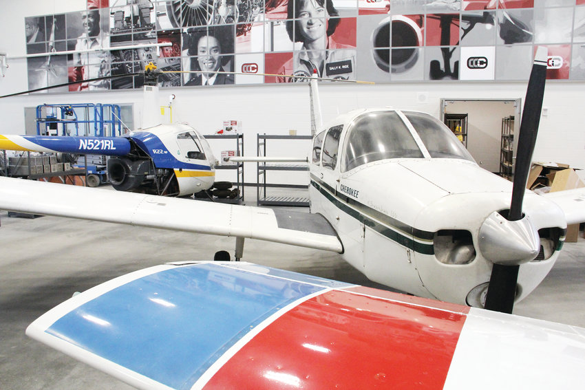 Planes and a helicopter sit at the Cherry Creek Innovation Campus, where students will perform maintenance work on the aircraft as part of the aviation maintenance program, one of many they can take at the new campus.