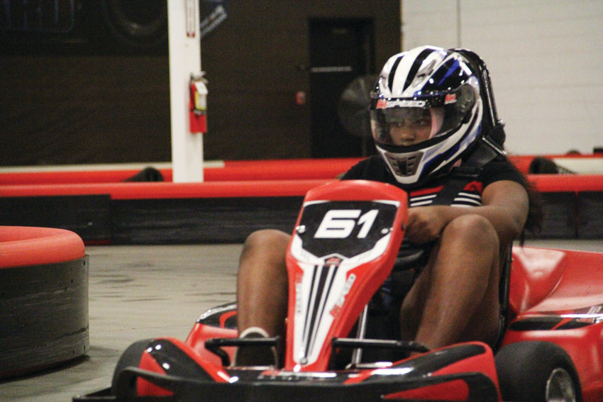 Bhavagnya Somala, 12, rounds a corner at K1 Speed July 25 in Highlands Ranch.
