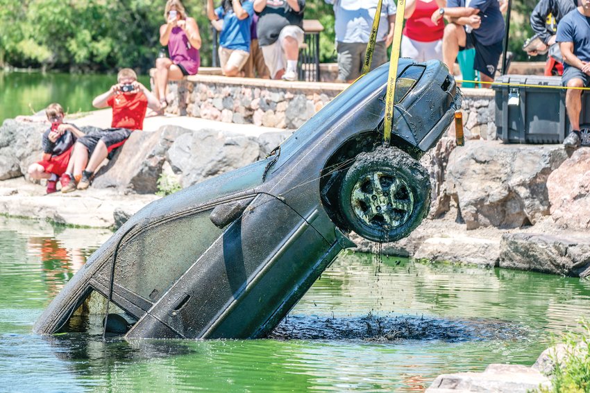 Divers searching for a gun found a stolen car in Ketring Lake on July 23, but how long it's been submerged is a mystery.