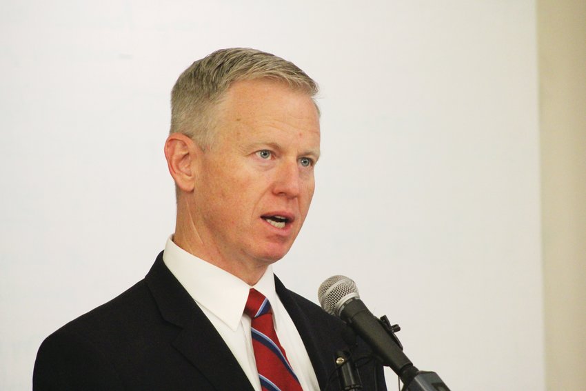 District Attorney George Brauchler, shown at a press conference earlier this year, wants to crack down on the illegal sale of firearms.