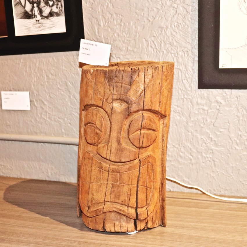 "Tiki Head" by student Chamuel Duran was displayed in the RE/MAX Alliance office.