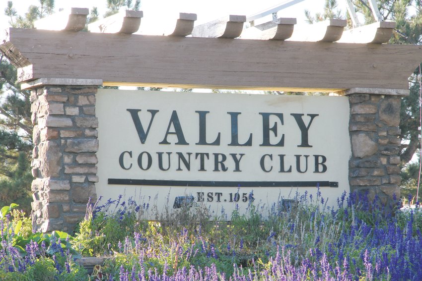 A sign for the Valley Country Club sits near East Arapahoe Road and South Chambers Way on Oct. 2. The club’s golf course is right next to a small Centennial neighborhood.
