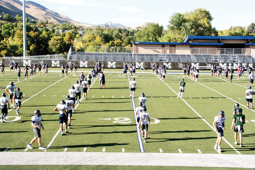 The Colorado School of Mines Orediggers warm up during practice on Oct. 8. The greater community is invited to celebrate homecoming with Mines during its homecoming parade and football game on Oct. 19.
