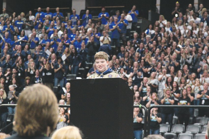 Rocky Heights Middle School student Kendall Meibos speaks to thousands of Douglas County School District employees at the Pepsi Center.