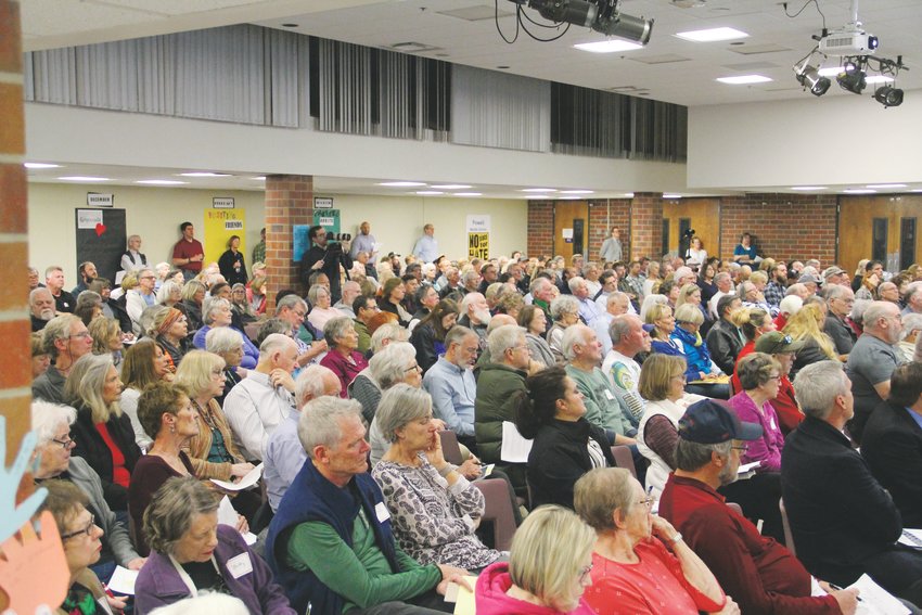 Hundreds filled a meeting about redevelopment at The Streets at SouthGlenn Nov. 19 at Powell Middle School.