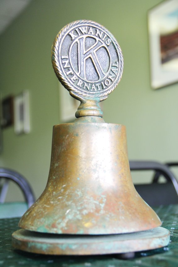 An old bell bearing the logo of Kiwanis International sits at a Jan. 23. meeting of the Kiwanis Club of Belmar. It came from an antique store in Canada, according to club member Mike Shaw. Local clubs generally receive bells from the international organization and ring them at the start and end of their meetings, according to the Belmar club.