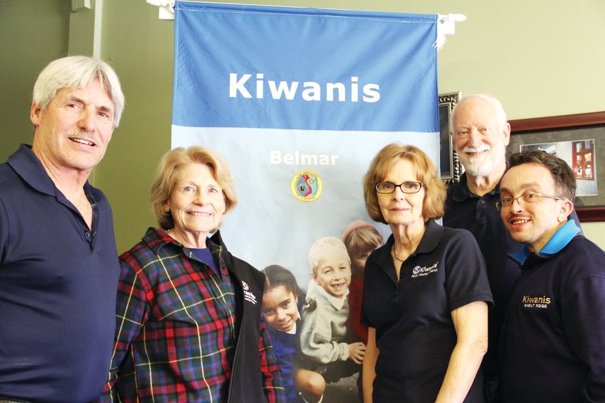 From left, Mike Shaw, 63, of Lakewood; Shirley Otto, 70, of Lakewood; Jane Braithwaite, 69, of the Columbine area; Steve Otto, 69, of Lakewood; and Dominick Breton, 35, of Wheat Ridge, pose next to a banner for the Kiwanis Club of Belmar, a community service organization in Lakewood.