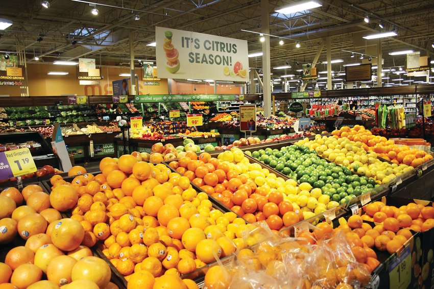 Fresh produce at the King Soopers at 7984 W. Alameda Ave. Richard Schemmel, the store's produce manager, said some of his employees are offering to stay late and work long hours to help keep the grocery store up and running.