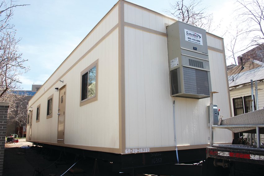 Swedish Medical Center has installed a trailer outside its emergency room in case the emergency room gets too packed. The hospital is also dedicating units for COVID-19 patients.