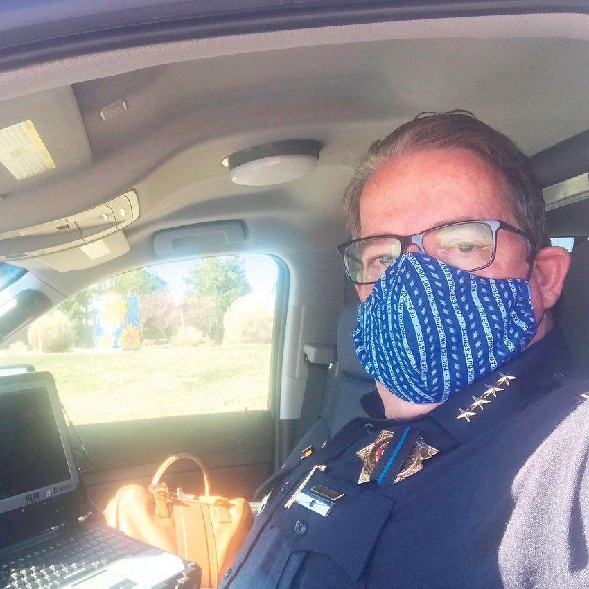 Sheriff Tony Spurlock sports a face mask while on patrol duty April 8. Spurlock saw many people complying with the stay-at-home order while he drove around the county, he said.