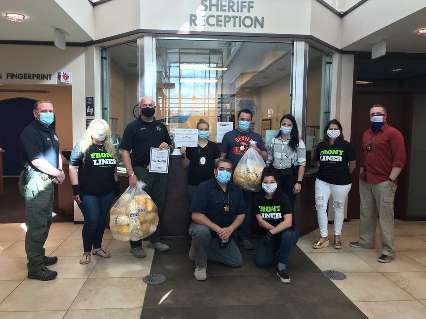 Cornzapoppin of Highlands Ranch donated 29 bags of popcorn to the Douglas County Sheriff’s Office’s Highlands Ranch substation on May 1, and Servpro of Englewood/East Littleton donated another 40 bags.