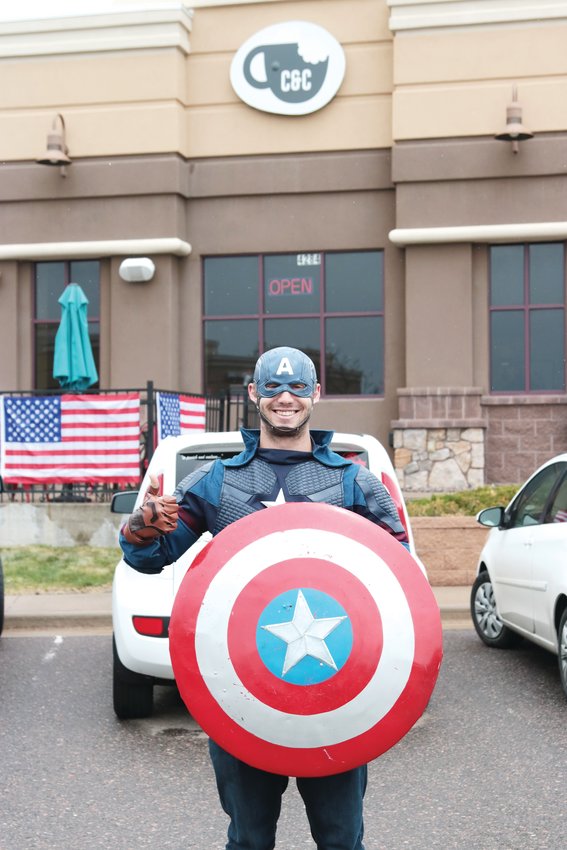 Castle Rock resident Tyler Magana dressed in a Captain America costume in support of C &amp; C restaurant in Castle Rock May 11 and promoted the restaurant.