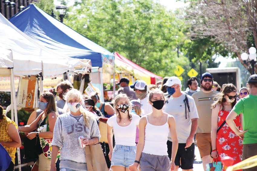 The narrow walkway down Mainstreet during the farmer’s market makes it difficult for shoppers to social distance, but for the most part people have learned to stay in small groups and distance from others as much as possible. Most have gotten into the habit of wearing masks in public or large gatherings.
