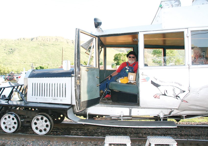 In a 2019 file photo, Gary Cryan, a volunteer at the Colorado Railroad Museum, gets ready to take a group for a ride on the Galloping Goose. This year, the Goose is mothballed for now, replaced by open-air cars.