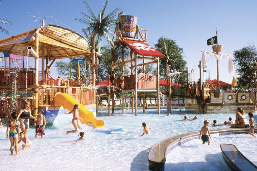 You won’t likely see Englewood’s Pirates Cove Water Park as crowded as this file photo this year.