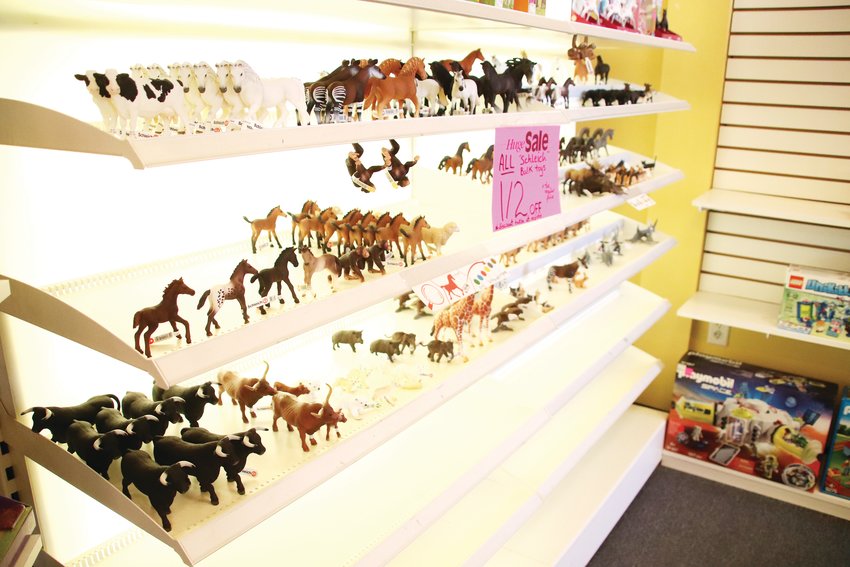 Miniature animal figurines on sale at Timbuk Toys in Highlands Ranch were marked down to half off in a closing sale July 23.