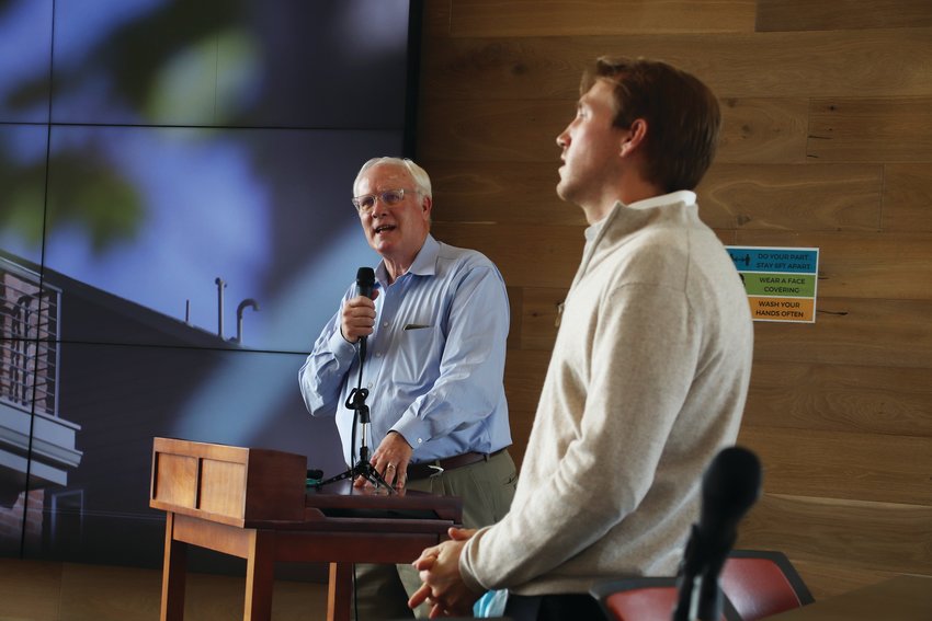 Sterling Ranch founder Harold Smethills, left, speaks at a Colorado Competitive Council Base Camp event about the community's past and future. Chief Technology Officer Brock Smethills, right, also spoke in the event.