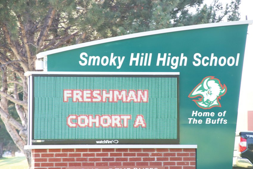 The electronic sign outside Smoky Hill High School in the east Centennial area Aug. 18 displays the phrase “freshman cohort A.” Middle- and high-schoolers in Cherry Creek School District are assigned to “A day” or “B day” groups, based on their last name, to lessen the number of students attending school on any given day and support social distancing.