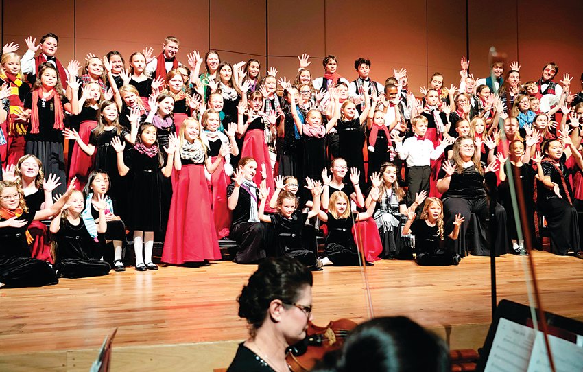 Young Voices of Colorado performs its 2019 winter concert at the Newman Center for the Performing Arts. The choir will hold a virtual fundraising gala on Oct. 3, though in-person performances are unlikely to occur before 2021.