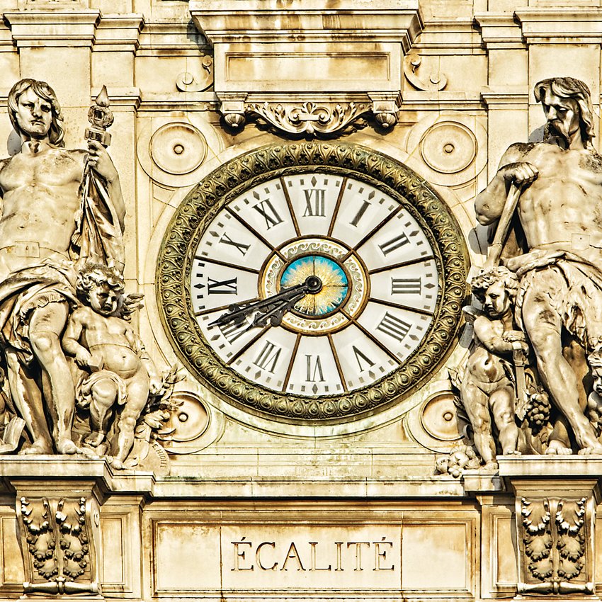 “Egalite” photograph by Loren Gilbert is included in the “It’s a Small World” exhibit at Town Hall Arts Center. It’s a clock set in a historic stone building.