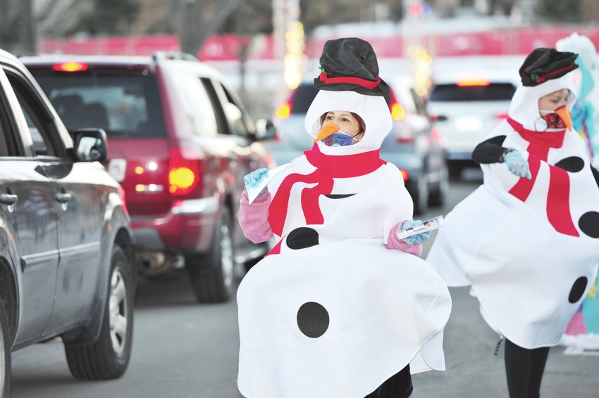 "Olaf", one of the characters from the Disney movie "Frozen", prepares to greet drive-through guests at this year's Noel Northglenn, Dec. 4, at the Northglenn Community Center.