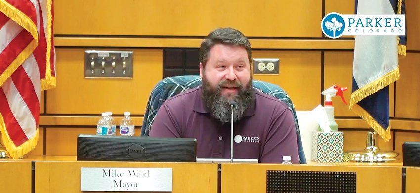 Mike Waid speaks during his final meeting as mayor of Parker in December.
