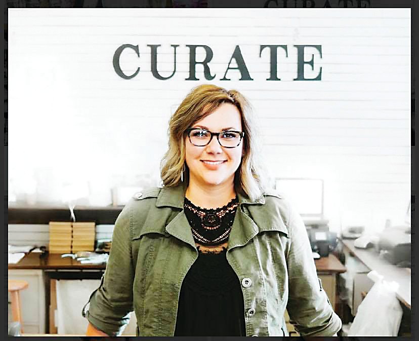 Karli Millspaugh, owner of Curate Mercantile and Maker’s Market, stands for a portrait.