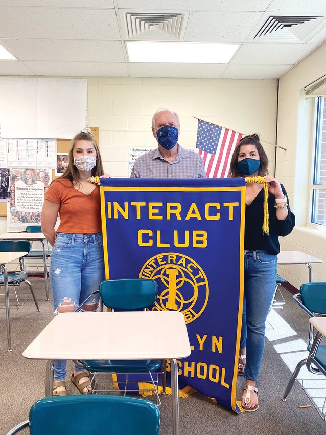 D’Evelyn senior Megan Stein with Andy McKean and Interact club teacher/sponsor Stacey McSkimin.