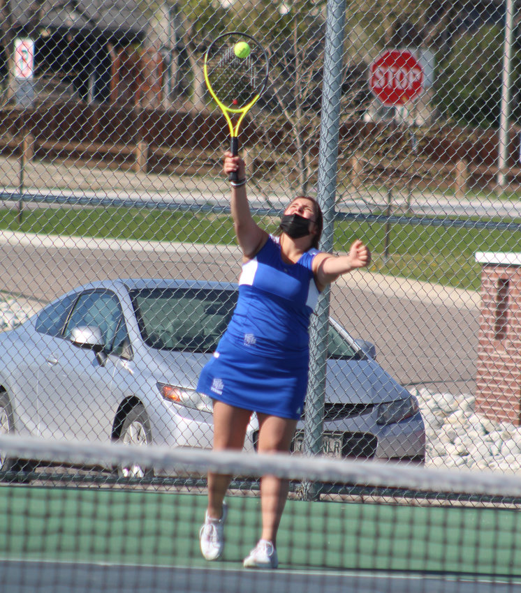 Fort Lupton's Tiffany Gaecia warms before her No. 1 singles match against Skyview's Ashelen Mas May 6 in Thornton.
