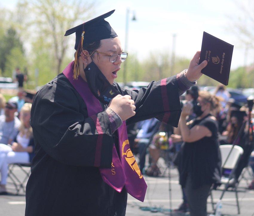 Hip hip hooray! Eagle Ridge Academy grad Ramon Ranzinger celebrates his diploma and the end of high school May 19.