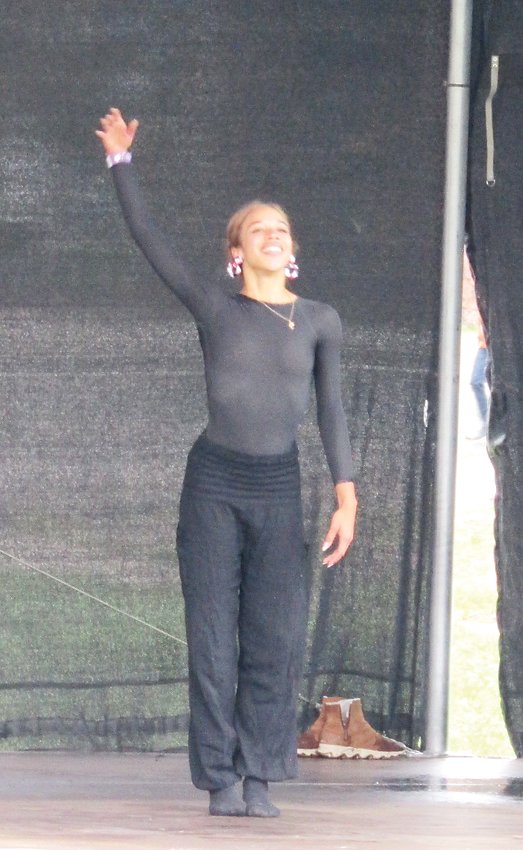 A Colorado Ballet dancer acknowledges the applause after dancing to a song performed by Franny and the Jetts.