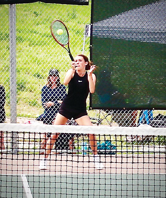 Mountain Vista sophomore Lauren Hayes hits a forehand return during the Region 5 No. 1 singles final June 2 against Arapahoe’s Julia Rydel. Hayes won the title with a hard-fought three-set victory.