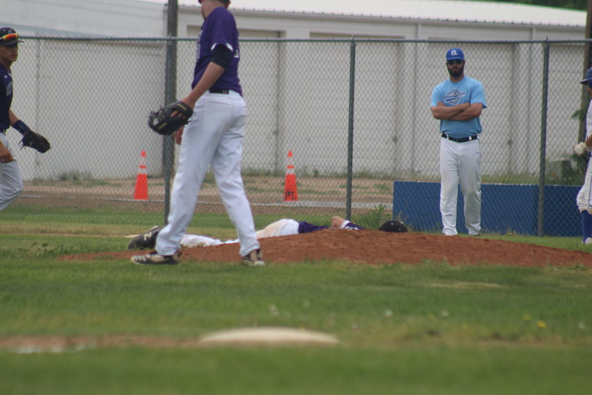 but Gutierrez caught the ball for the out, even though the camera angle puts him behind the mound and out of view. The Wolverines won the first game of the doubleheader 12-0.