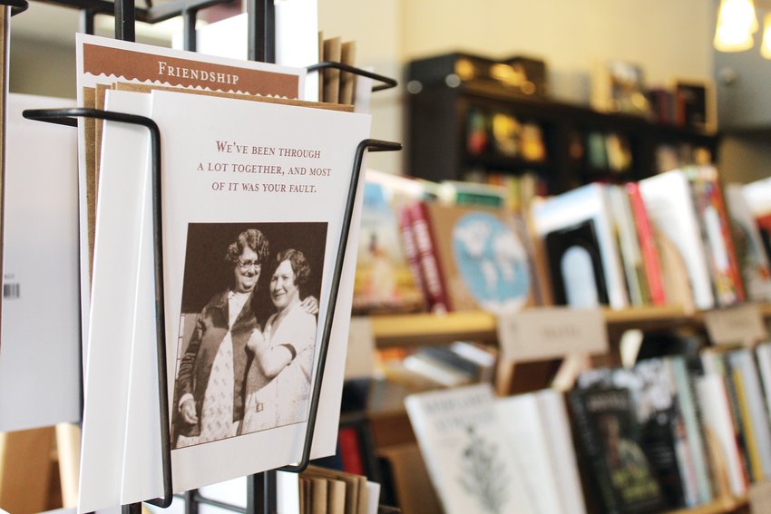 One Door Down, a new bookstore operated by and adjacent to Two Brothers Deli, features a variety of greeting cards, books, games, drinks and more.