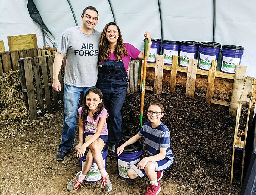 Corey and Amber McCool of Bailey and their children, Declan, 12, and Olivia, 9, have started Purple Bucket Compost that gives those on the 285 corridor a way to compost food scraps.
