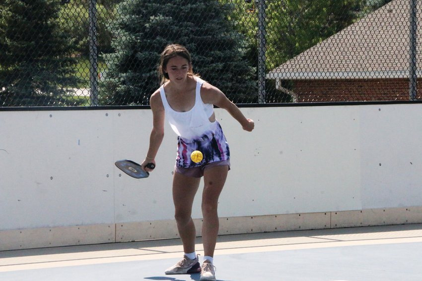 Heidi Haze, 19, makes the most of one of her first lessons in pickleball.