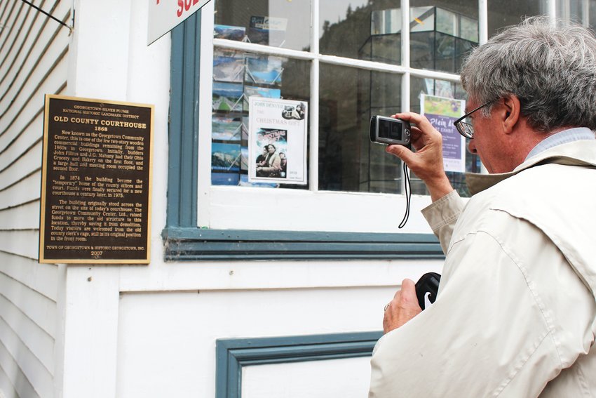 Brian O’Connor takes pictures of the Georgetown Community Center on July 14. O’Connor described how, once he decided that Clear Creek would be his final U.S. county to visit, the John Denver movie “The Christmas Gift” was on television shortly after, which he took as a fun coincidence.