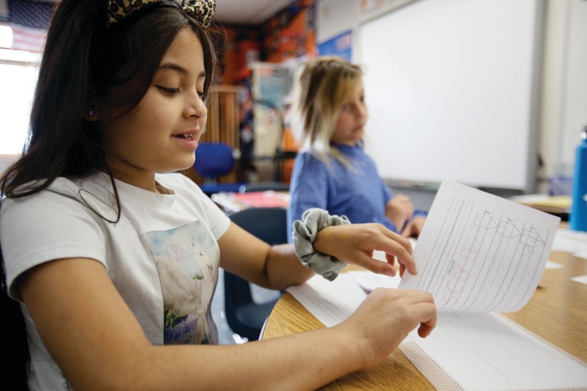 Penelope Miramontes, 8, works on her spelling in a breakout group at Bergen Meadow during summer school to get her prepared for the next school year.